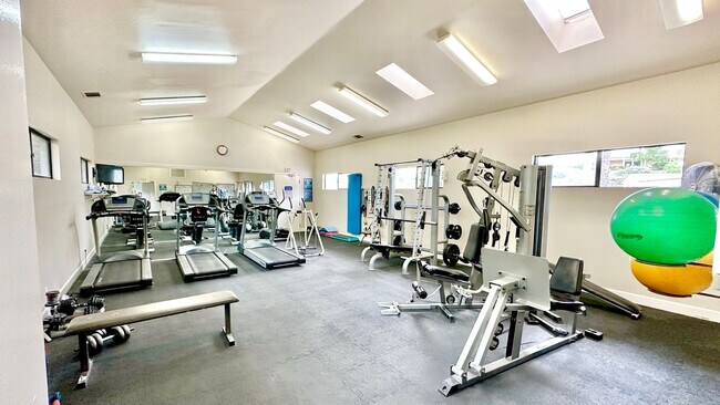 Building Photo - Light, Bright, and Freshly Updated Home in the Gated & Desirable Champagne Village 55+ Community!