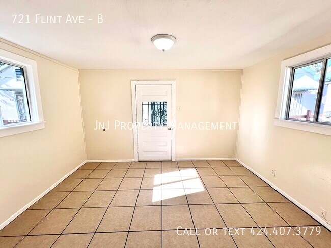 Building Photo - 721 N Flint Ave