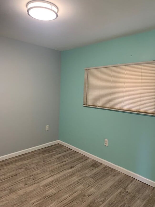 Building Photo - TRI-PLEX