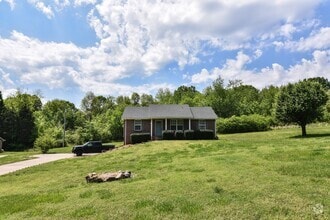 Building Photo - Three Bedroom in Sango!