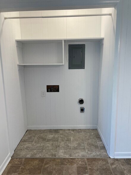 Open Laundry area in the dining area - 15521 Calhoun Road