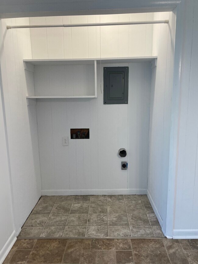 Open Laundry area in the dining area - 15521 Calhoun Road