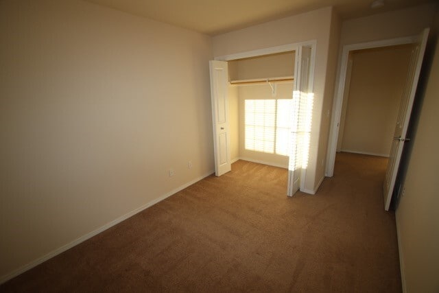Building Photo - 3 Bedroom Condo close to JBER w/ Fenced Backyard!