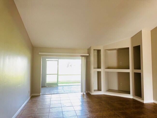 Building Photo - Experience this Cape Coral 3 bedroom 2 bath corner duplex with 1 car garage and screened in lanai.