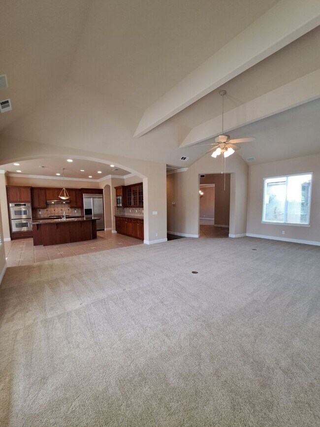 Building Photo - PRICE REDUCED TO $3795 – Custom Clovis Residence in Gated Community | Spacious Layout & 3-Car Gar...