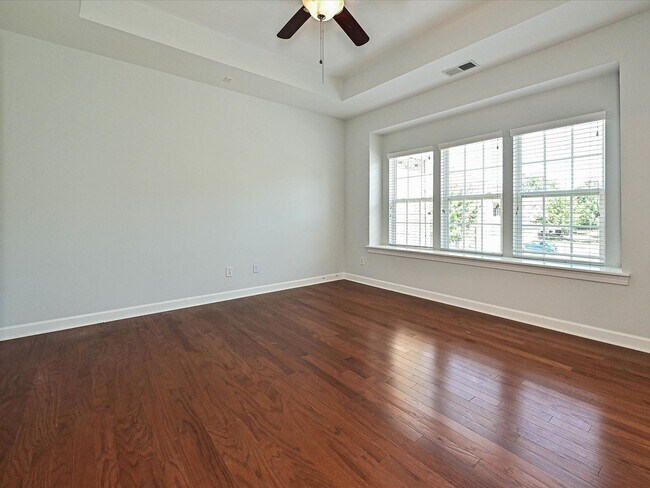 Building Photo - Stylish Condo Living with Open Concept, Garage & Outdoor Space