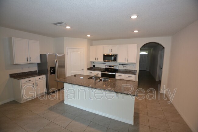 Building Photo - 5777 Arlington River Dr.