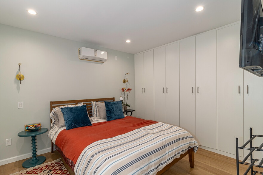 9114 W. 24th St. Guest House Bedroom with wall A/C and storage and queen sized bed - 9116 W 24th St