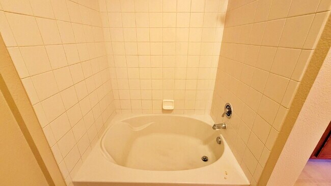 Building Photo - NEW CARPET NEW PAINT!! Clean and Bright 2BR 2BTH Condo Close To DIA. Gated Community in First Cre...