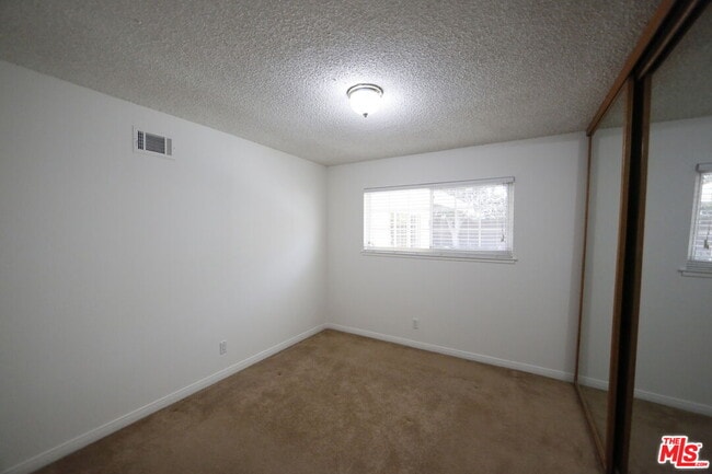 Building Photo - 7309 Asman Ave