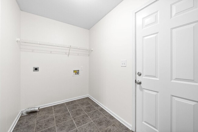 Building Photo - Pet Friendly Three Bedroom with Bonus!