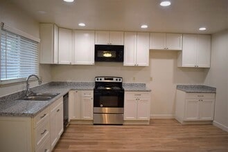 Building Photo - 4-bedroom home with luxury vinyl flooring and much more!