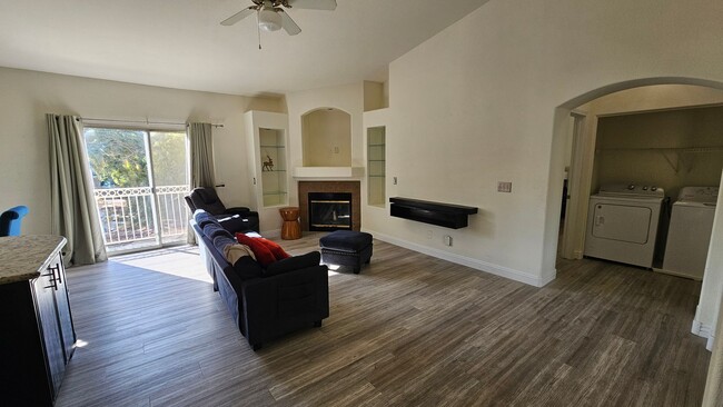 Building Photo - Partially Furnished 2/2 CONDO WITH  *BONUS DEN* & 2 CAR GARAGE!