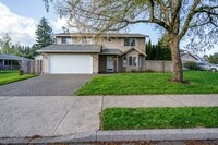 Building Photo - Recently Updated with Wood Laminate Flooring and Fresh Paint