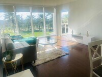 Building Photo - 10275 Collins Ave