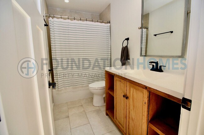 Building Photo - Renovated San Marin Townhouse | loft, A/C & 2-Car Garage - FOUNDATION