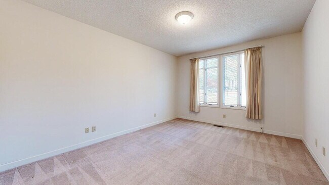 Building Photo - The Mylandia | Beautiful and spacious University City – Charlotte house with a backyard, offering...
