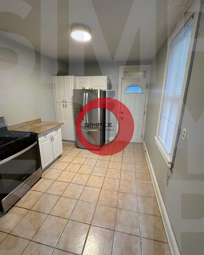 Building Photo - Three Bedroom one bath with off street parking