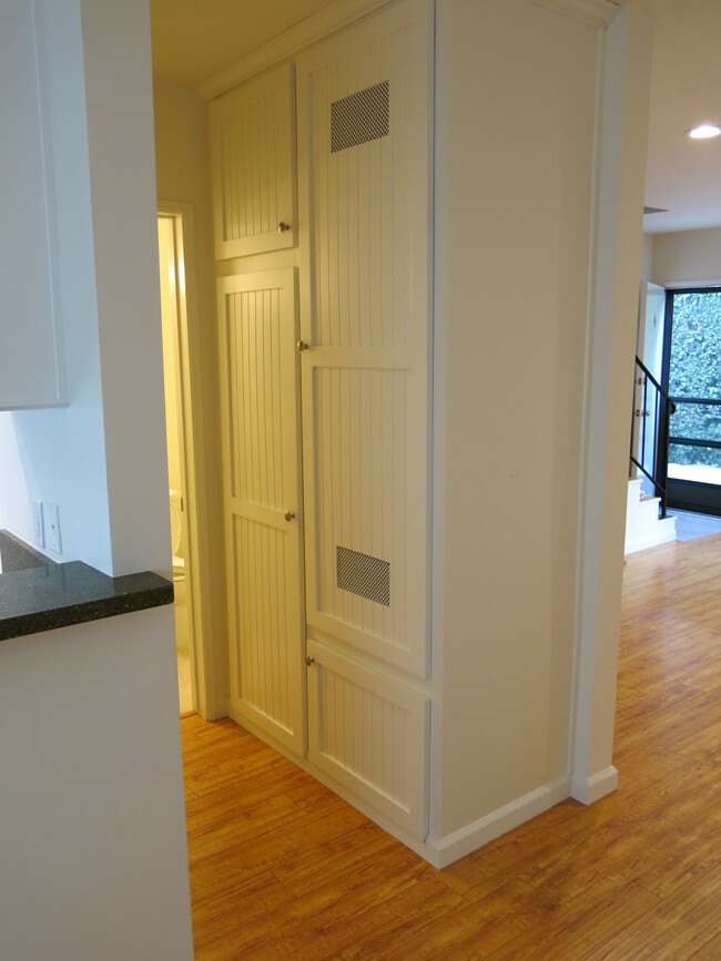 Hallway going to downstairs bathroom. - 512 Hill St