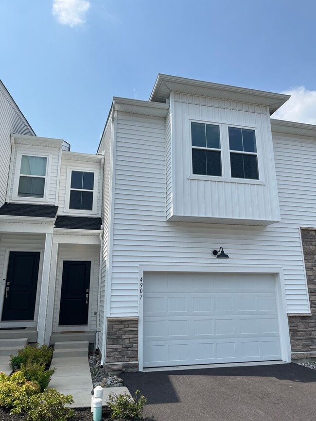 Primary Photo - Move-in-ready Brookside Court townhome off...