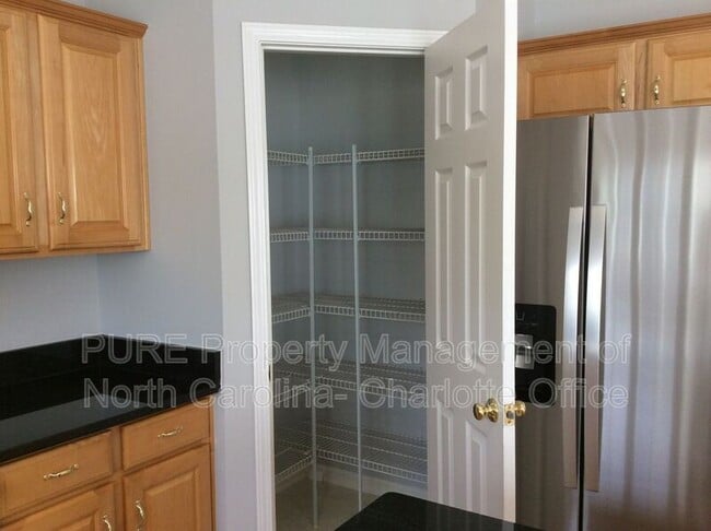 Building Photo - 7713 Noland Woods Dr