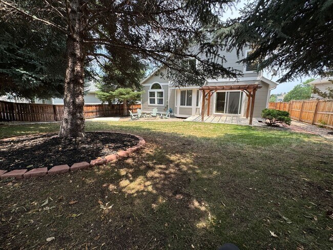 Building Photo - Available for Rent in Lone Tree's Desirable Carriage Club Neighborhood!
