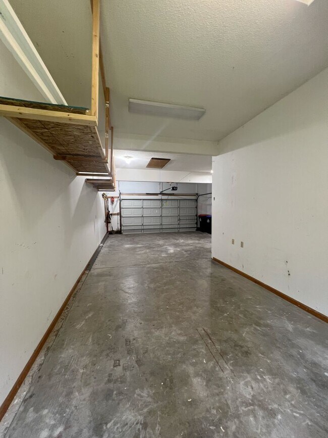 Building Photo - SEE IT NOW: Spacious 4-Bed Home with Finis...