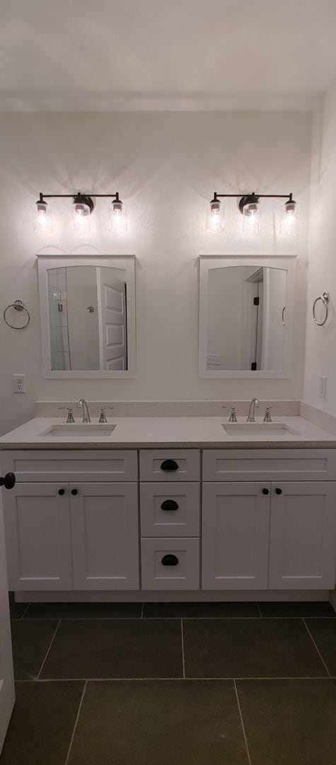 Building Photo - 5-bedroom home with 3 car garage and fully...