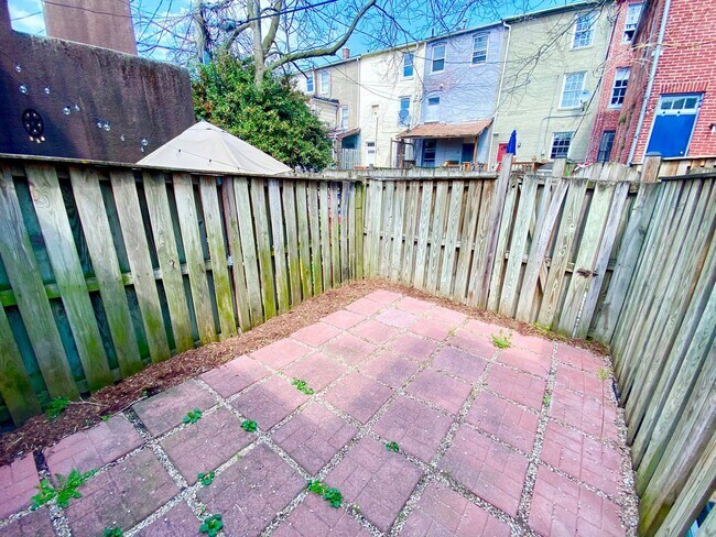 Building Photo - Charming 1BR with 1.5 Baths and Bonus Basement Room in the Heart of Ridgley’s Delight