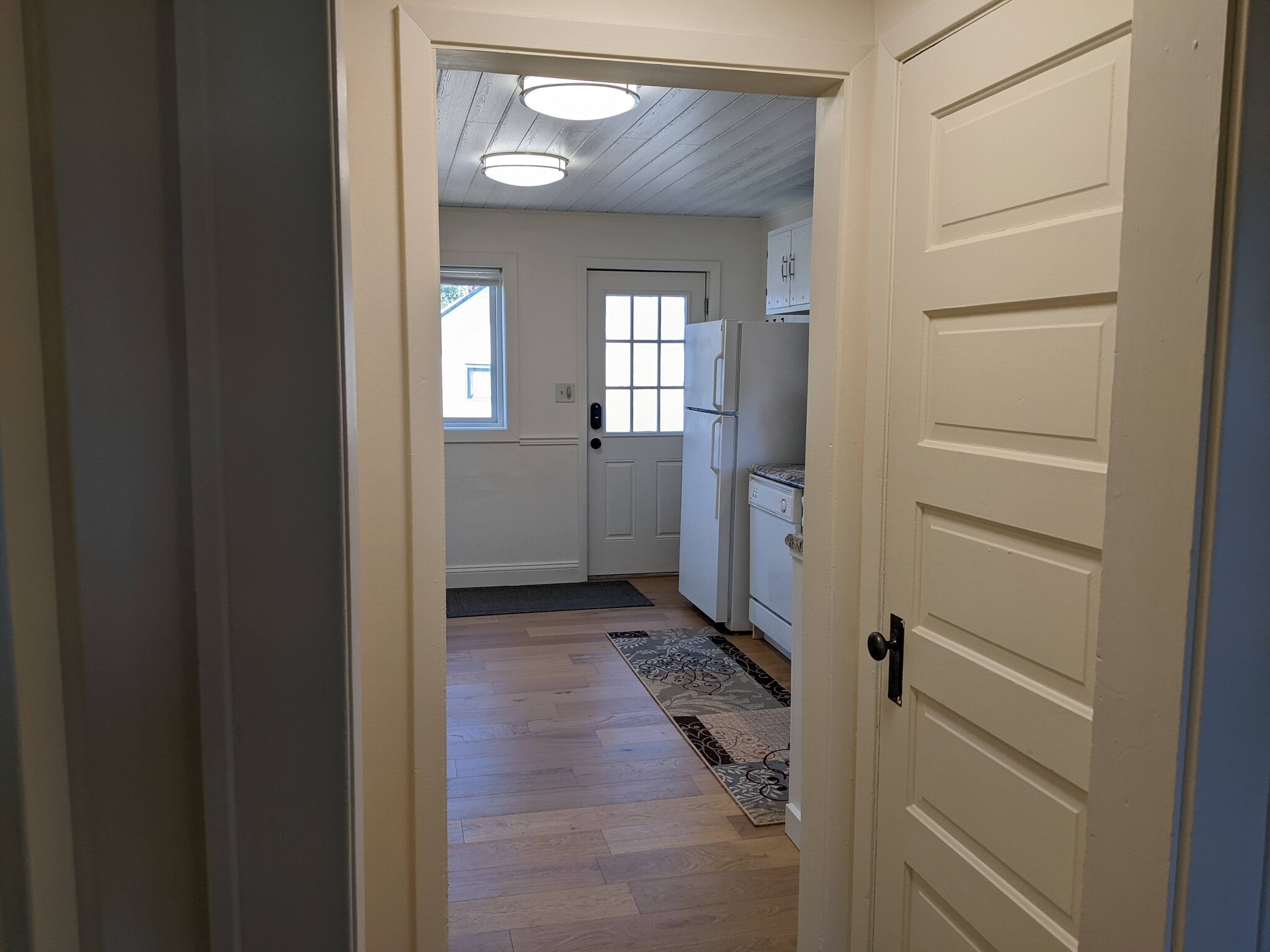 First floor hall looking through kitchen to back door - 4419 Cooke St