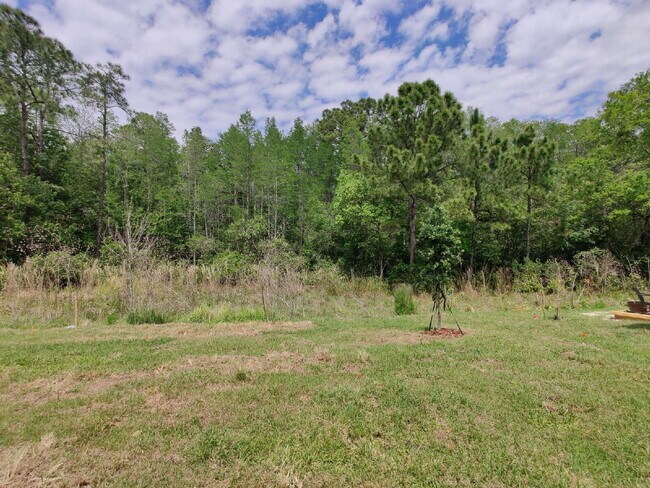 Building Photo - 7527 Cypress Walk Dr