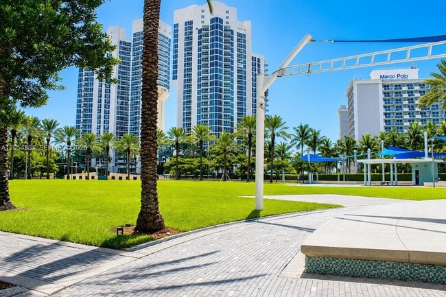 Building Photo - 19370 Collins Ave