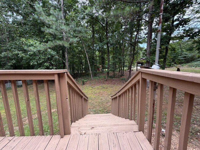 Building Photo - Large 4/2 with finished basement/bonus room- $1,895