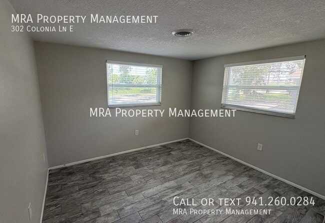 Building Photo - 302 Colonia Ln E