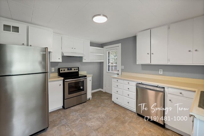 Building Photo - CHARMING WESTSIDE 2BD DUPLEX - NO RENT TILL JANUARY!! - Security Deposit Waiver Available