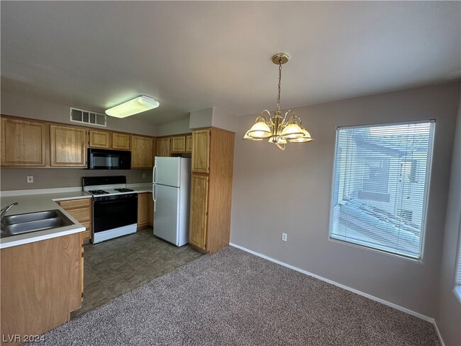 Building Photo - 5710 E Tropicana Ave