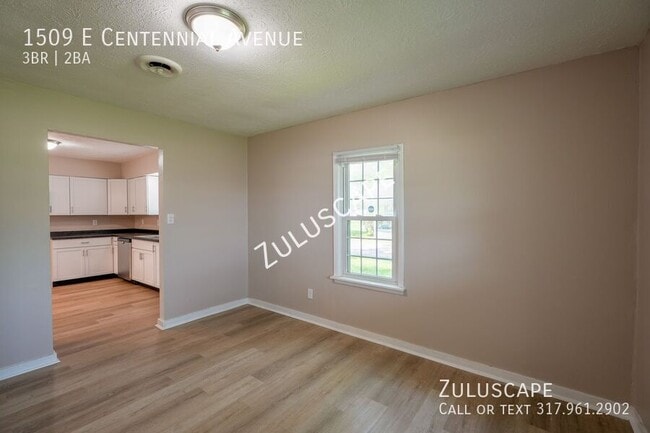 Building Photo - 1509 E Centennial Ave