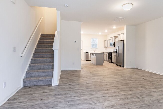 Building Photo - Charming 3-Bedroom End Unit Townhome Near Jack Alexander Blvd - MOVE IN SPECIAL