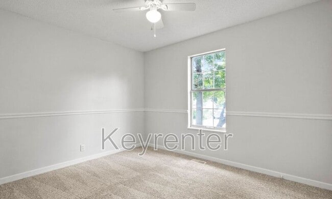 Building Photo - 6600 Woodcock Cir