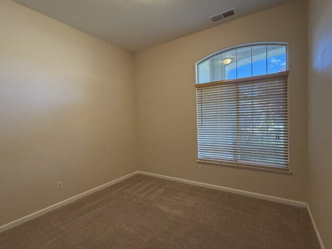 Building Photo - South Reno Home with 4 Bedrooms + 3 Car Garage!