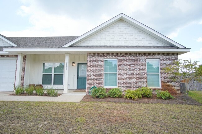 Building Photo - Gulf Breeze 3BR/2BA Townhome – Vaulted Cei...