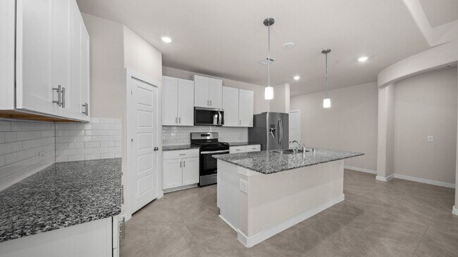 Building Photo - Spacious and well-maintained 4-bedroom, 3.5-bath home in desirable Pine Lake Cove offering flexib...