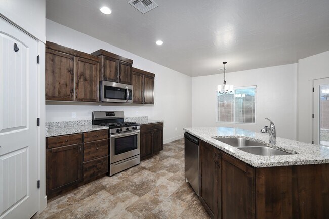 Building Photo - Comfort & Style: Spacious 3-Bed, PLUS LARGE OFFICE, 2-Bath Retreat in DESERT CANYON"