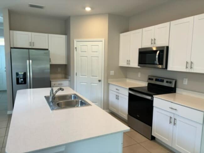 Building Photo - Owner Special: Half-Off First Month's Rent...
