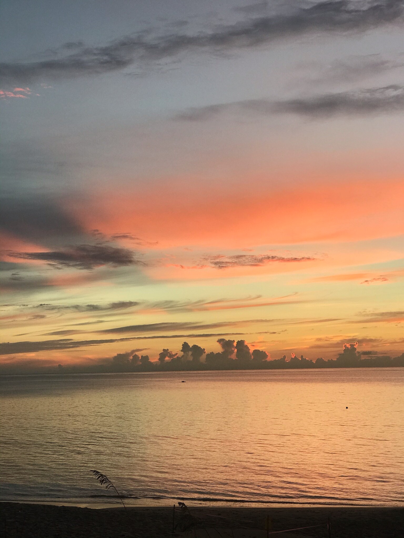 Walk to the beach to catch a gorgeous sunrise. - 15 S Golfview Rd