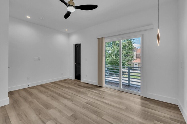 Building Photo - Modern New Construction Townhome with Roof...