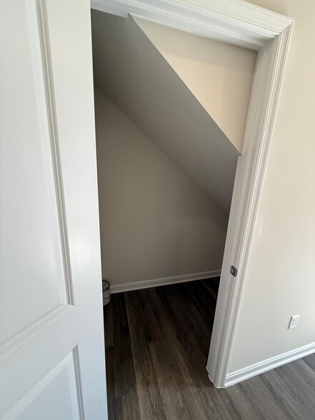 Storage space below stairs - 157 Tigney Dr