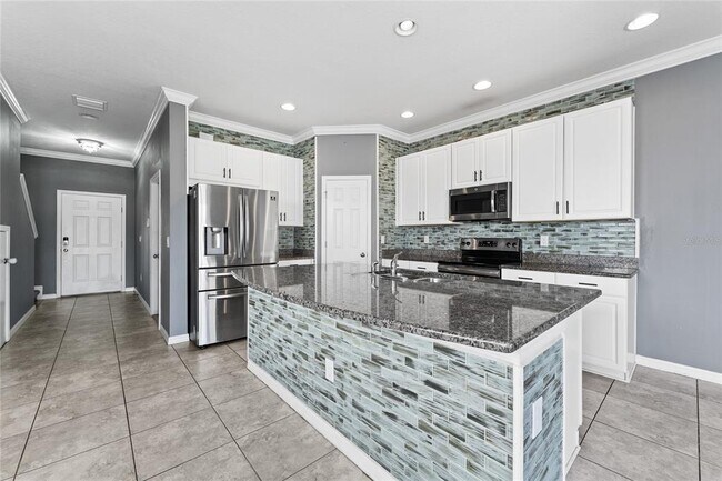 Building Photo - 7103 Grand Elm Dr