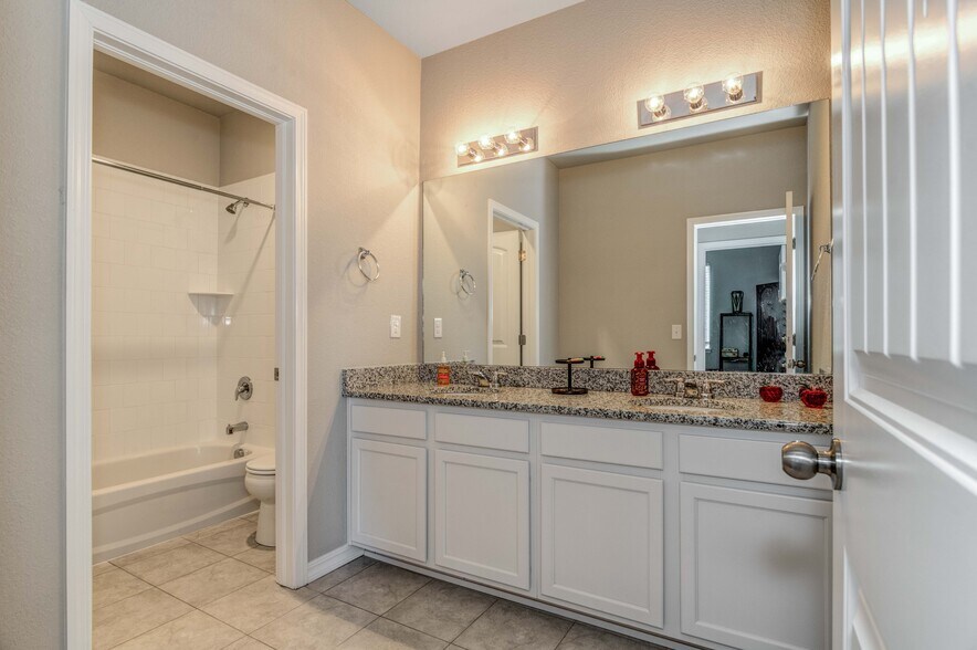 Upstairs bathroom - dual sinks - 5827 Morning Light Ter