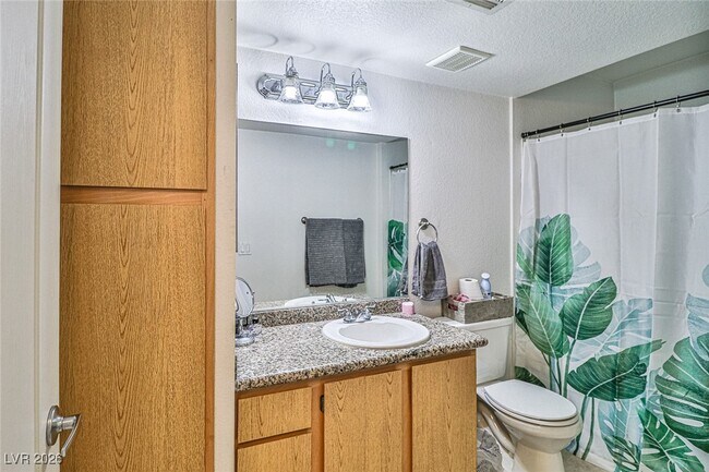 Building Photo - 5055 W Hacienda Ave